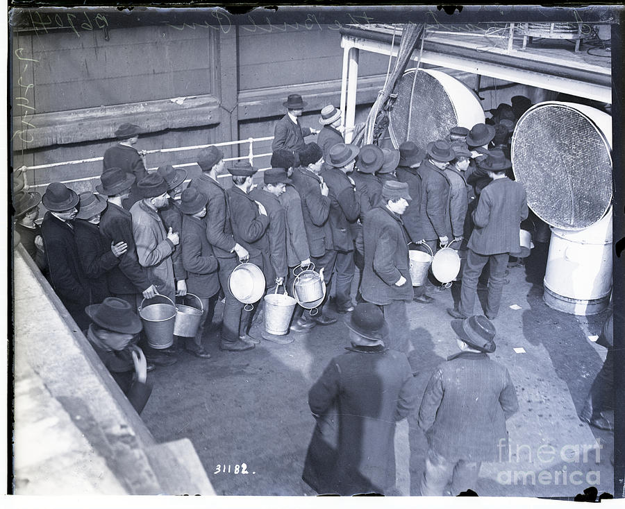 Immigrants In Line Holding Buckets Photograph by Bettmann