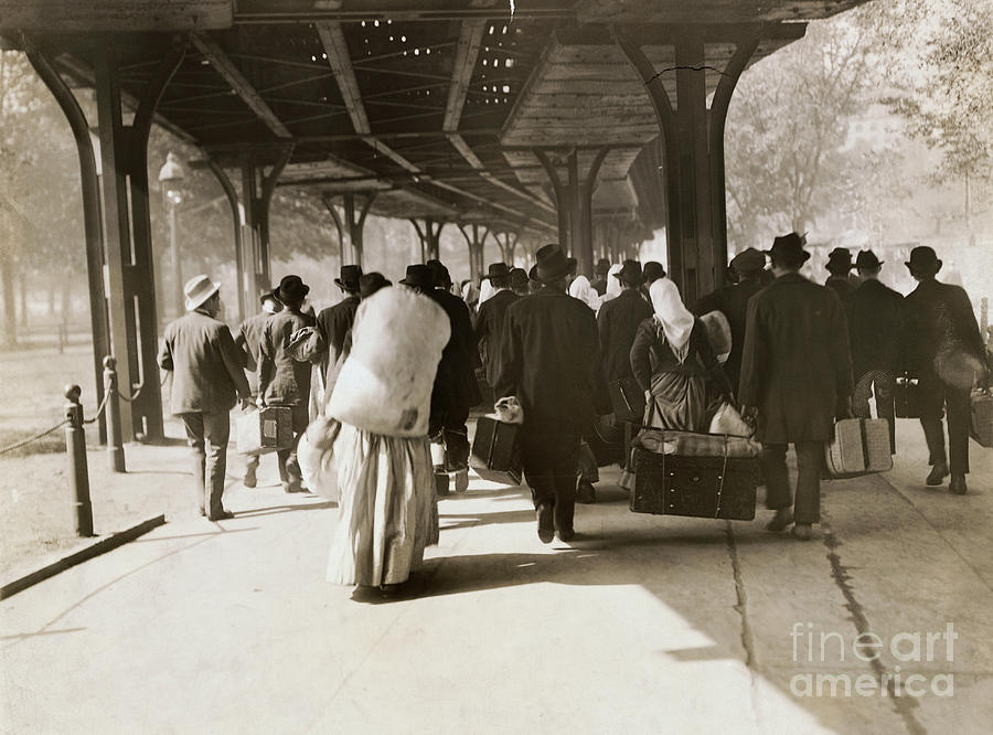 Immigrants Walking Through Battery Park Photograph by Bettmann