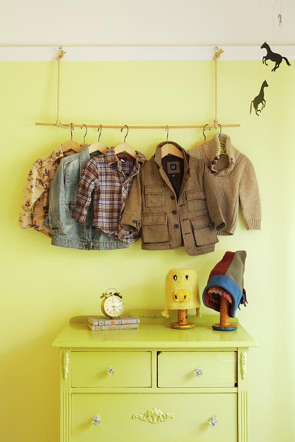 Improvised Childs Coat Rack Above Chest Of Drawers Photograph by Jennifer Martine