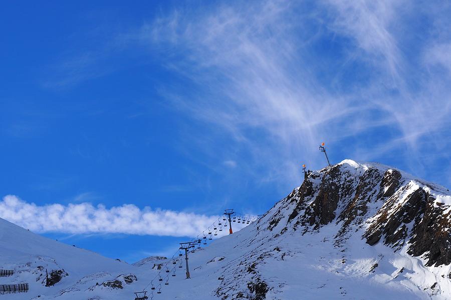 In The Obertauern Ski Area At Zehnerkar, Snow, Sky, Ski Lift, Ski Slope, Clouds, Alps, Winter In Salzburg, Austria Photograph by Thomas Stankiewicz