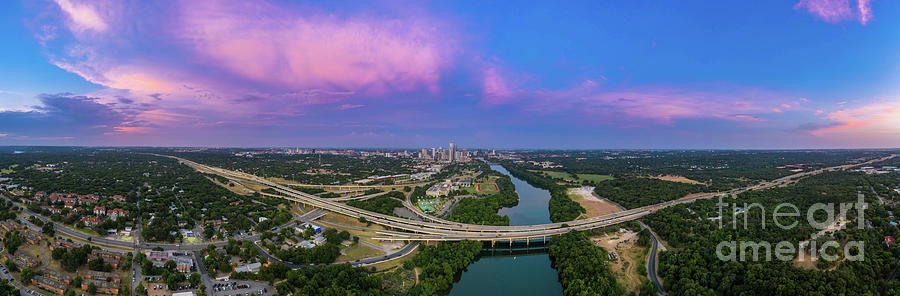 In this panorama image, a beautiful pink clouds like cotton candy paint the Austin Skyline by Herronstock Prints In this panorama image, a beautiful pink clouds like cotton candy paint the Austin Skyline by Herronstock Prints