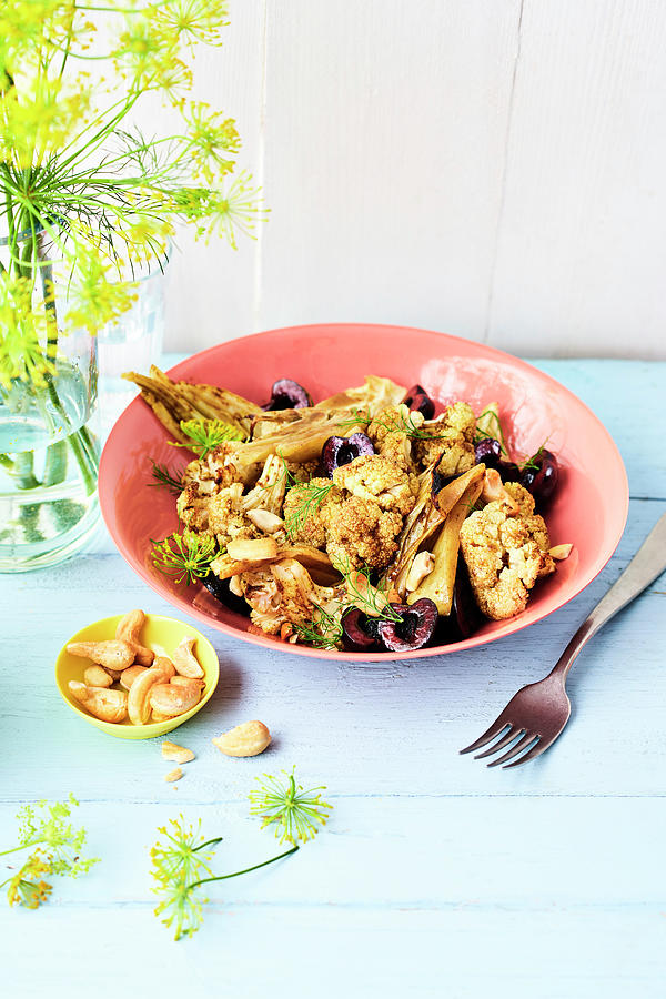 Indian Cauliflower Salad With Cashew Nuts And Cherries Photograph by Stockfood Studios / Andrea Thode Photography