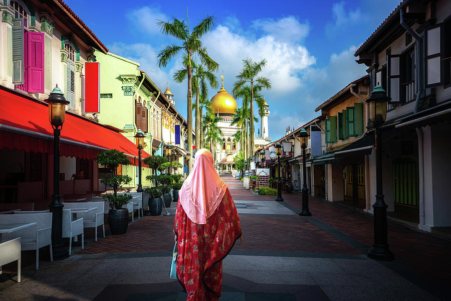 Indian lady walk and travel in Sultan mosque shopping street Photograph by Anek Suwannaphoom