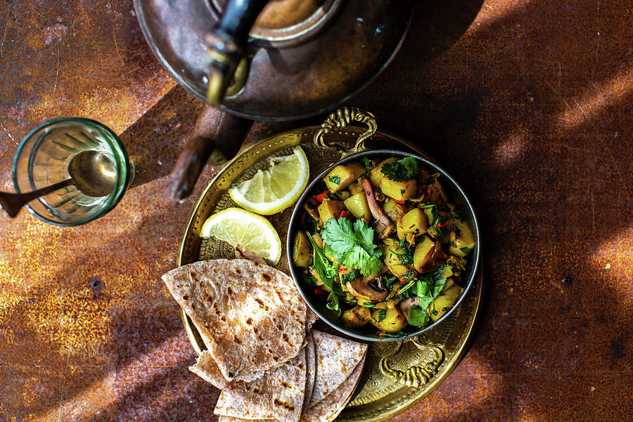Indian Potato, Spinach And Mushroom Curry Photograph by Lara Jane