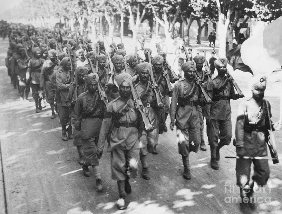 Indian Troops Marching Through France Photograph by Bettmann