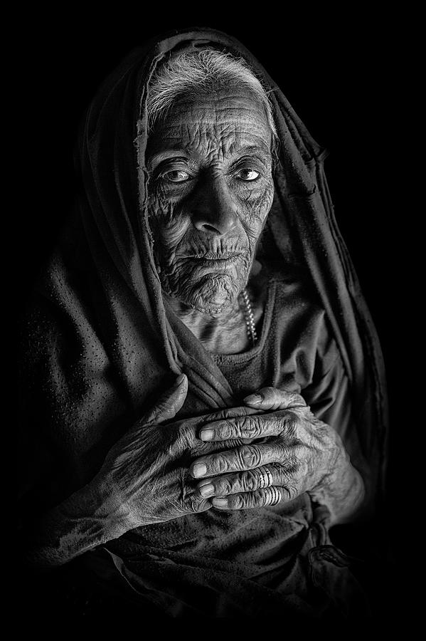Black And White Photograph - Indian Woman In Dark by Haitham Al Farsi