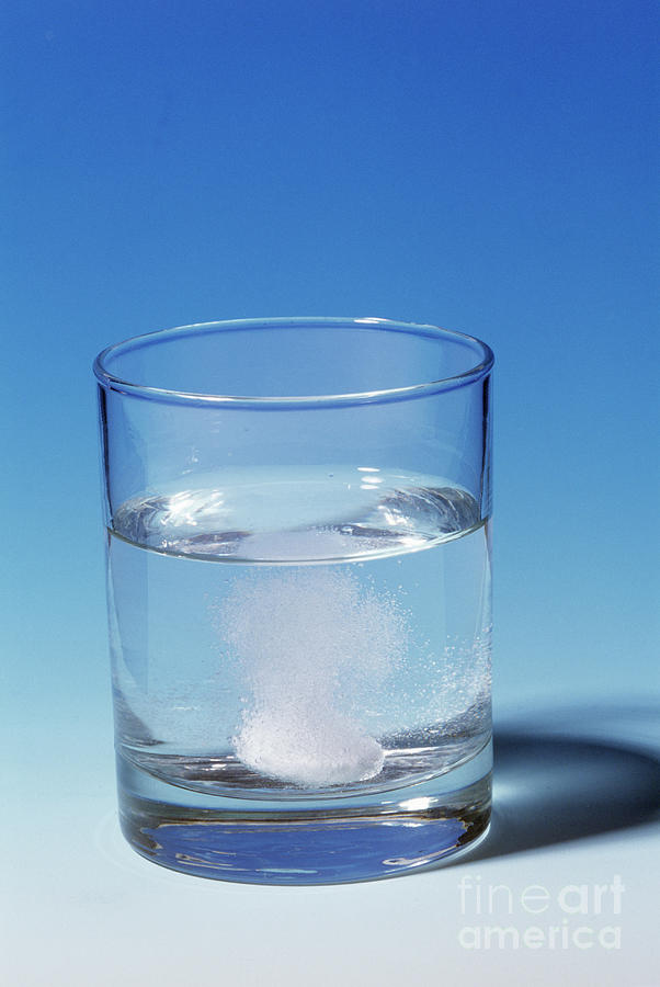 Indigestion Tablet Dissolving In Water Photograph by Martyn F. Chillmaid/science Photo Library