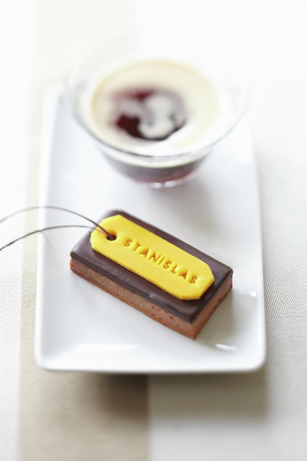 Individual Chocolate Torte With A Marzipan Label Photograph by Atelier Mai 98