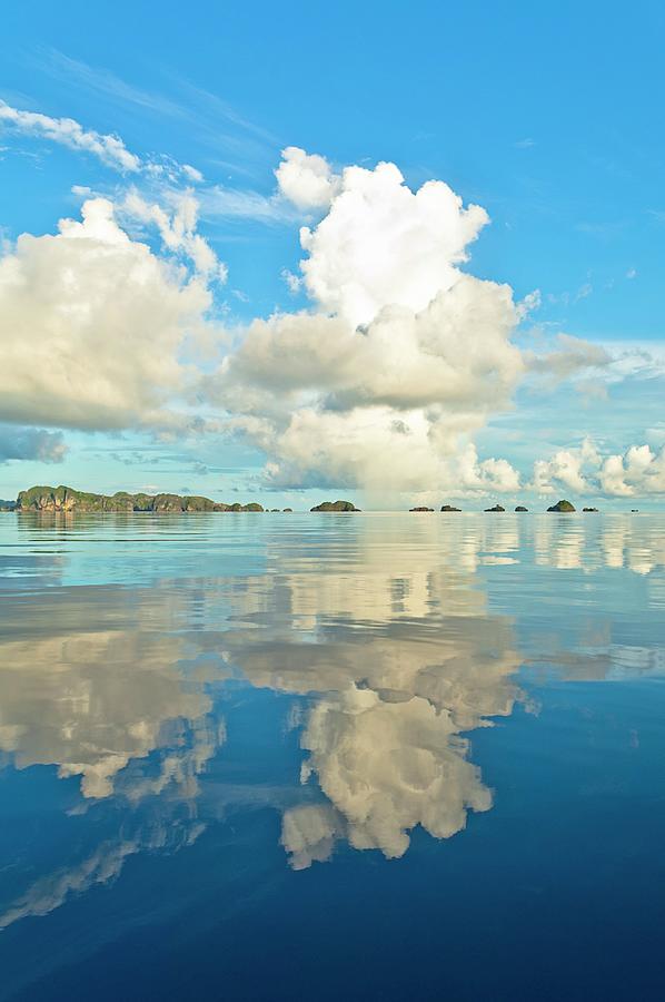 Indonesia, New Guinea, West Papua Province, Oceania, Blue Sky And Clouds Mirrored In Sea In Raja Ampat Islands, Misool Digital Art by Giordano Cipriani