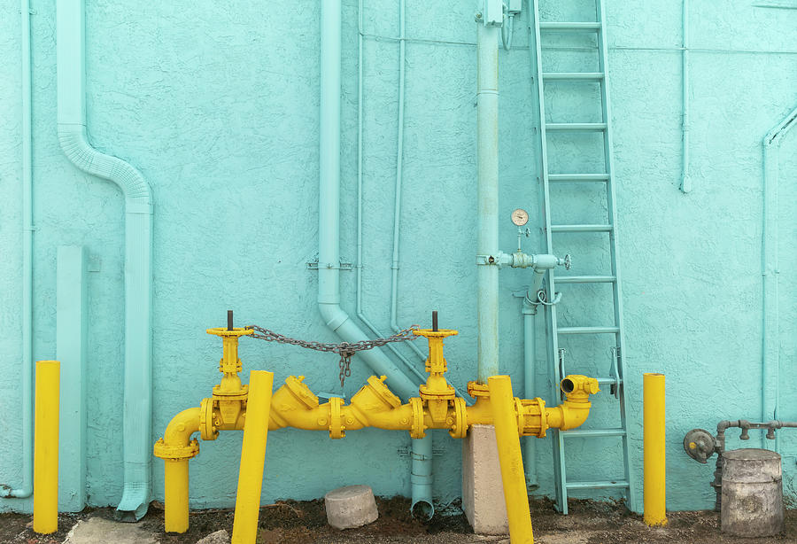 Industrial urban alleyway wall brightly colored. by Manny DaCunha Industrial urban alleyway wall brightly colored. by Manny DaCunha