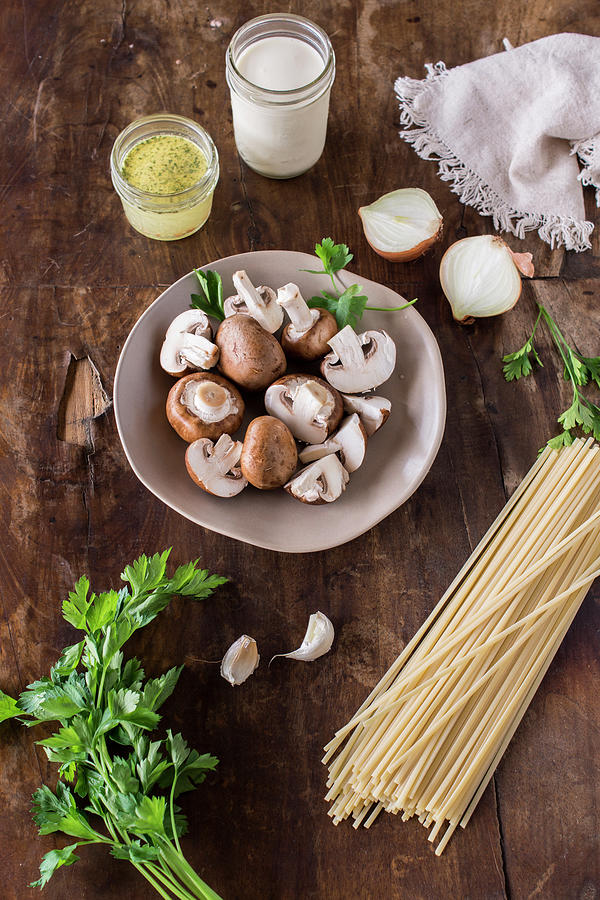 Ingredients For A Pasta Dish With Mushroom Sauce Photograph by Lieberbacken