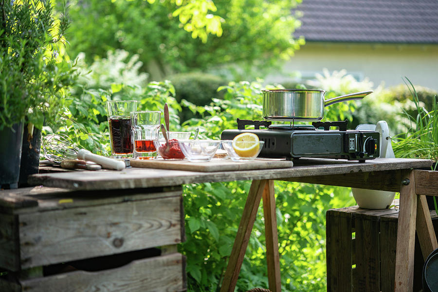 Ingredients For Homemade Barbeque Sauce On A Garden Table Photograph by Sebastian Schollmeyer