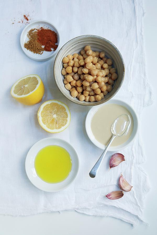 Ingredients For Hummus: Chickpeas, Tahini, Garlic, Lemon, Olive Oil, Paprika And Cumin Photograph by Victoria Firmston