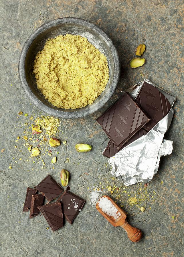 Ingredients For Pistachio Biscuits With Chocolate Glaze And Sea Salt Photograph by Jane Saunders