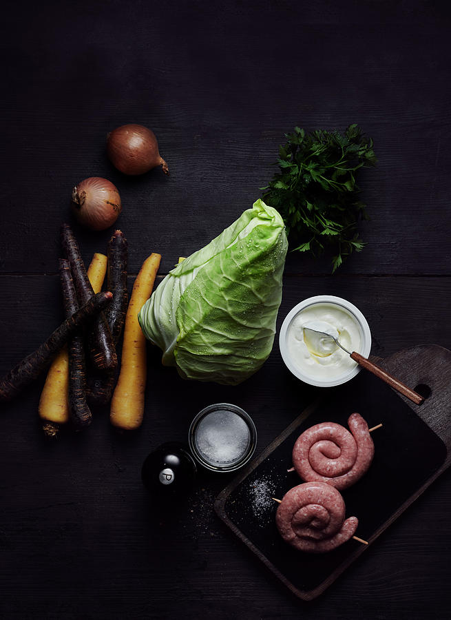 Ingredients For Pointed Cabbage Stew With Bratwurst Snails Photograph by Stefan Schulte-ladbeck