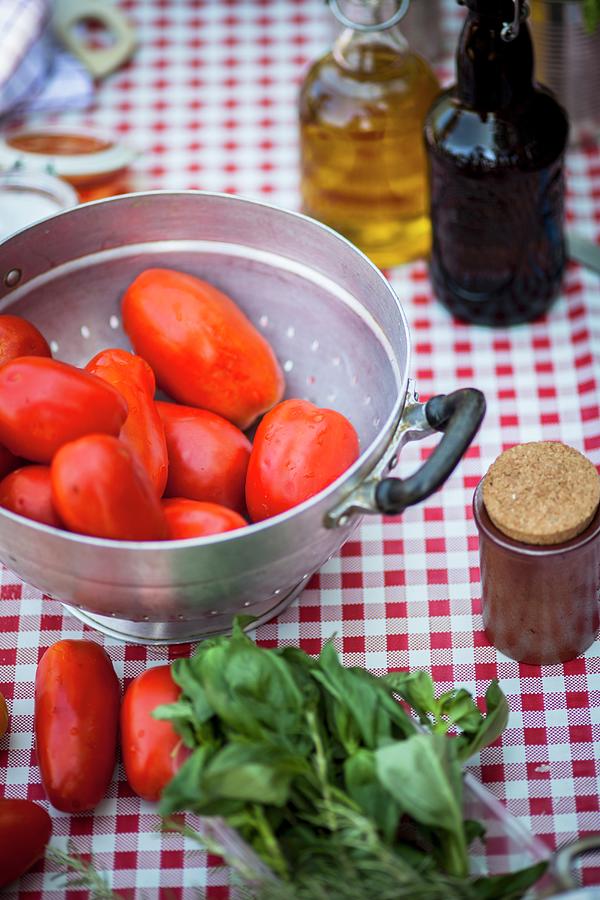 Ingredients For Tomato Sauce On A Table Photograph by Eising Studio
