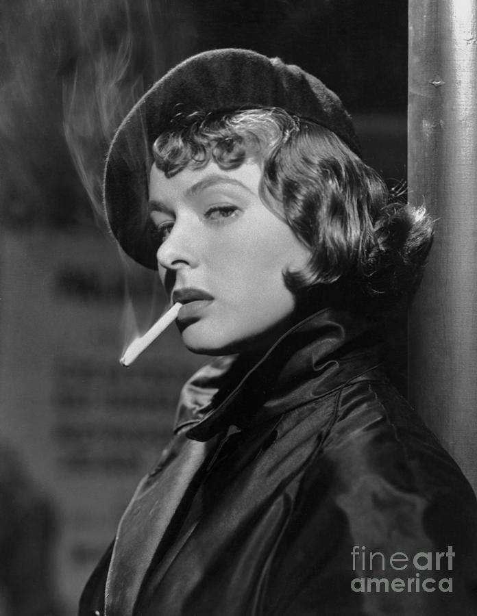 Ingrid Bergman Smoking Cigarette Photograph by Bettmann