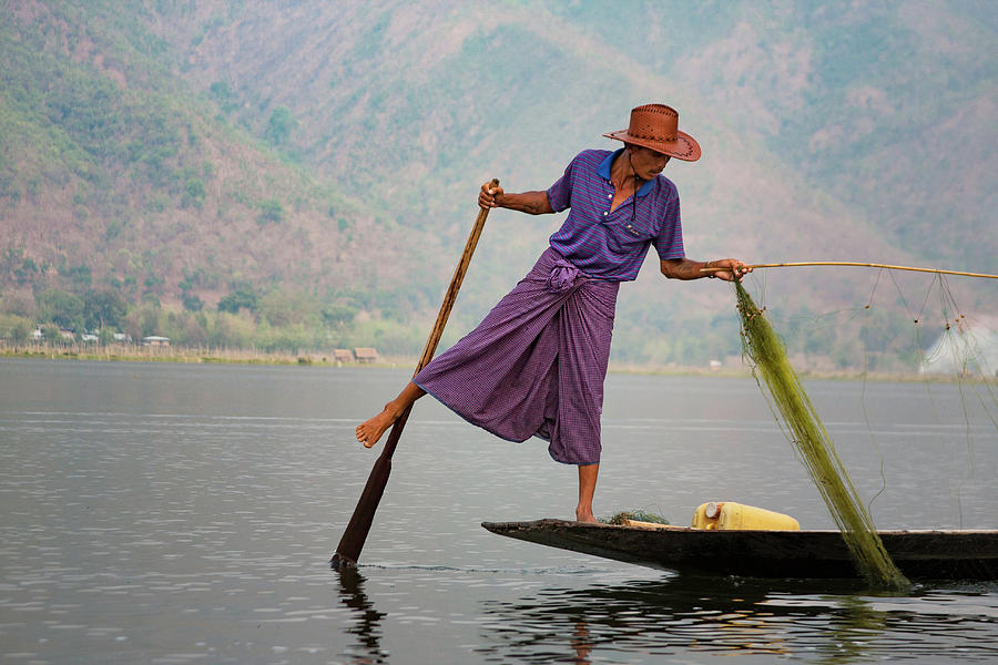 Inle Lakes fisherman 4 Photograph by Mache Del Campo
