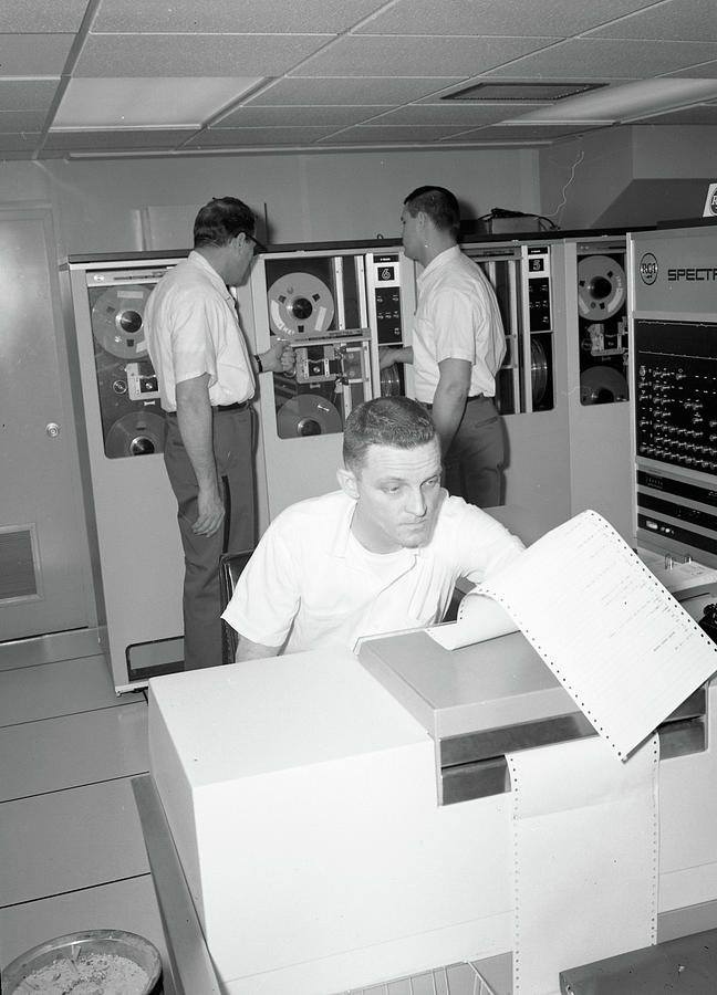 Inmates with an IBM computer and tape back-up system. Painting by Celestial Images