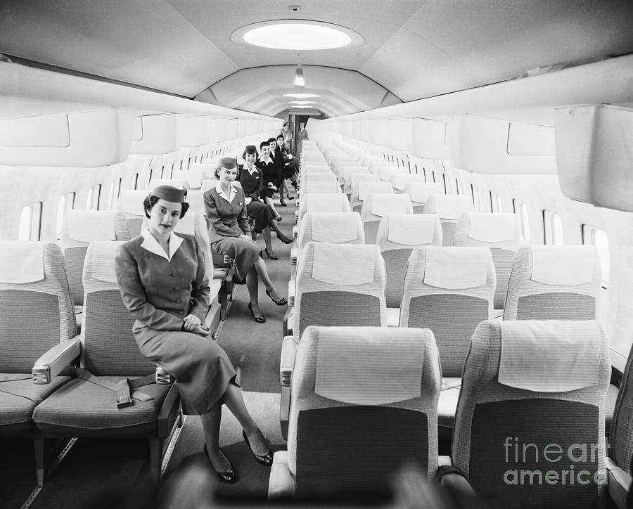 Interior Of Jet Mockup With Stewardesses Photograph by Bettmann