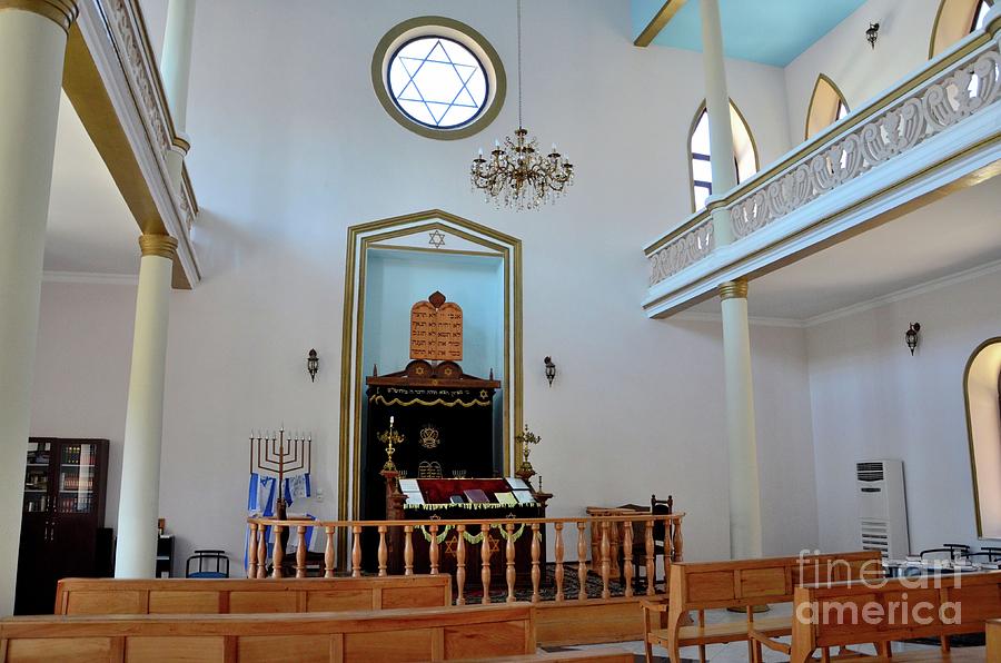 Interior of Jewish synagogue with Star of David pews altar menorah hanukkah candle Batumi Georgia Photograph by Imran Ahmed