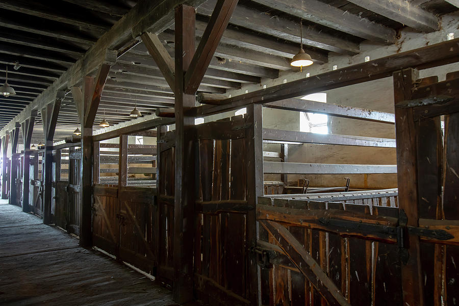 Interior of wooden Hungarian barn Photograph by Karen Foley