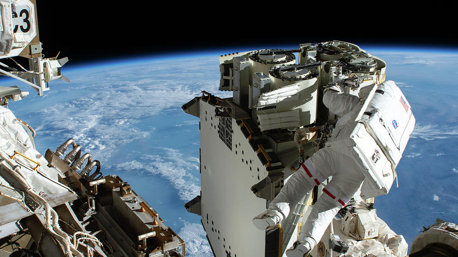 International Space Station Spacewalk Photograph by Science Source