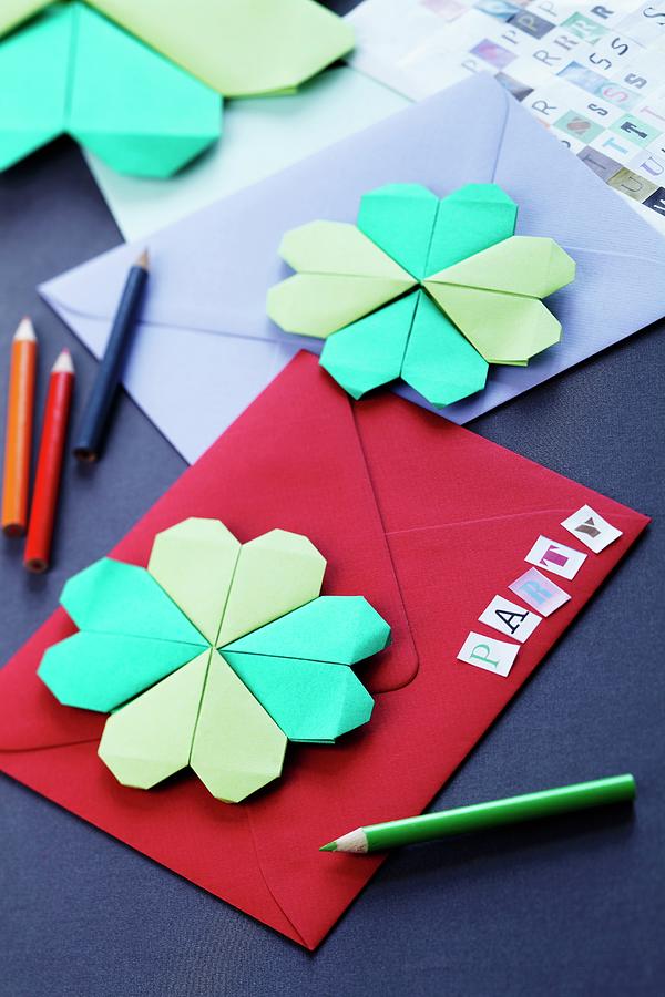 Invitation Cards Decorated With Origami Four-leafed Clovers Photograph by Franziska Taube
