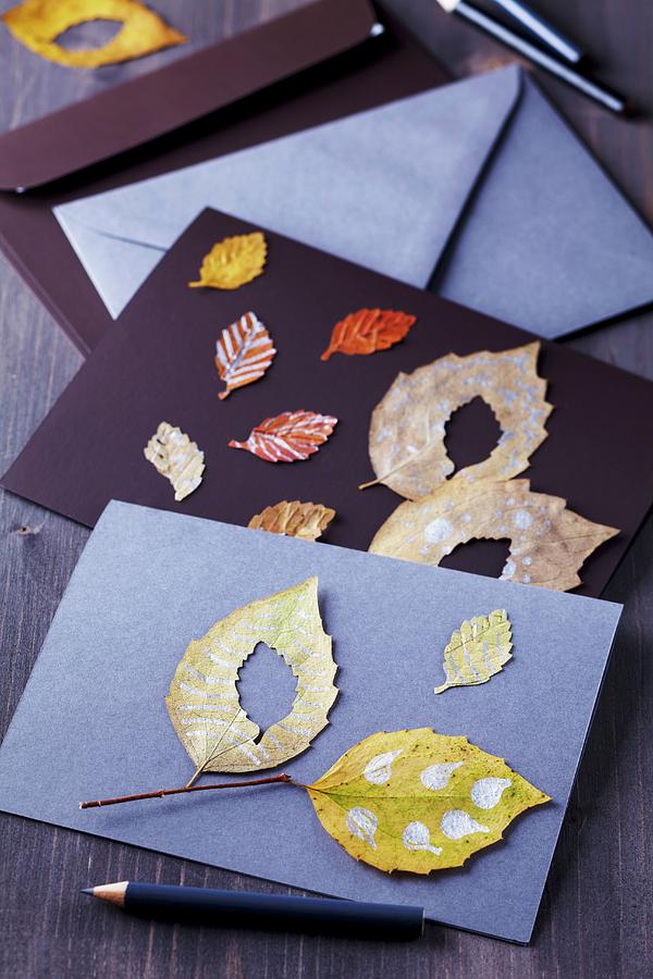 Invitation Cards Decorated With Painted Autumn Leaves Photograph by Franziska Taube