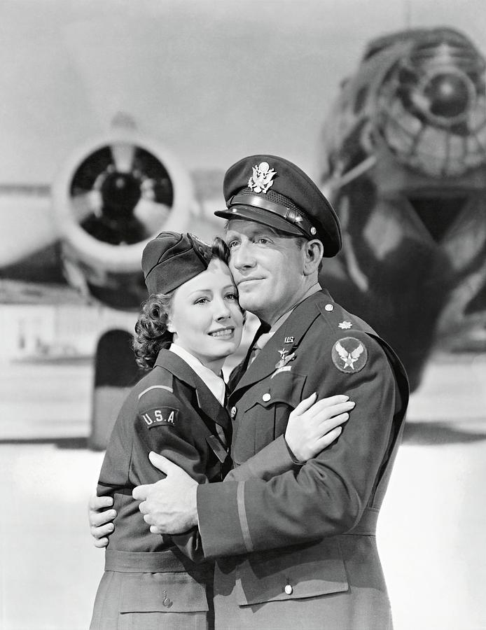 IRENE DUNNE and SPENCER TRACY in A GUY NAMED JOE -1943-. Photograph by Album