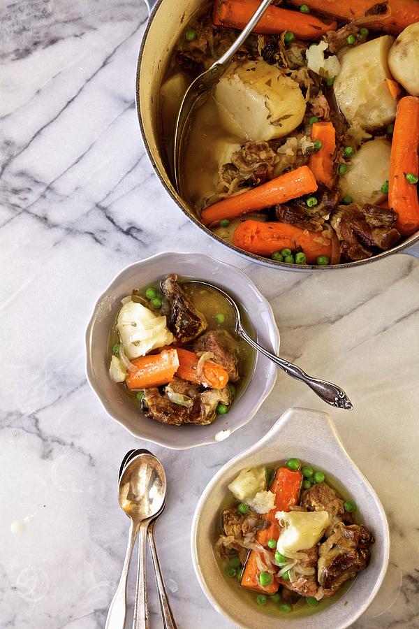 Irish Stew With Lamb Shoulder, Potatoes, Carrots, Onions And Peas emerald Isle, Ireland Photograph by Andre Baranowski