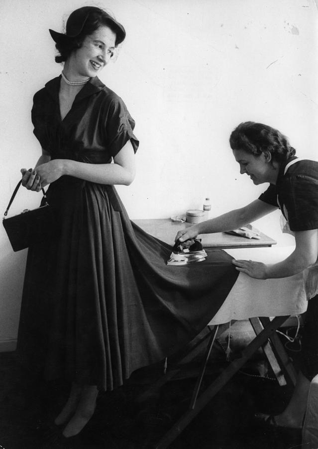 Ironing A Debs Dress Photograph by Erich Auerbach