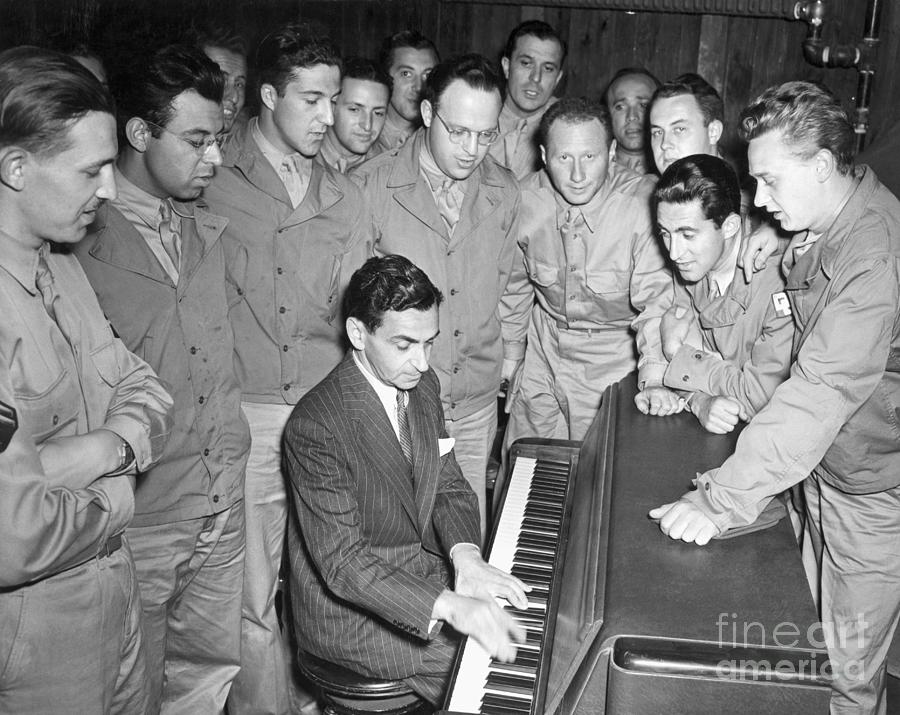 Irving Berlin Playing Pianous Troops Photograph by Bettmann