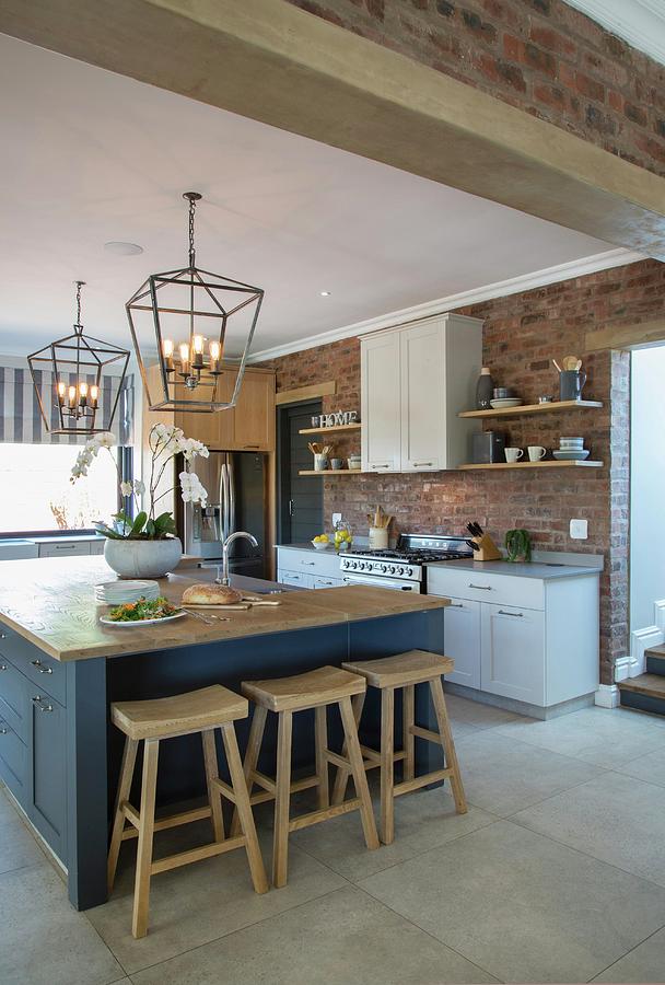 Island Counter And Brick Wall In Contemporary Country-house Kitchen Photograph by Great Stock!