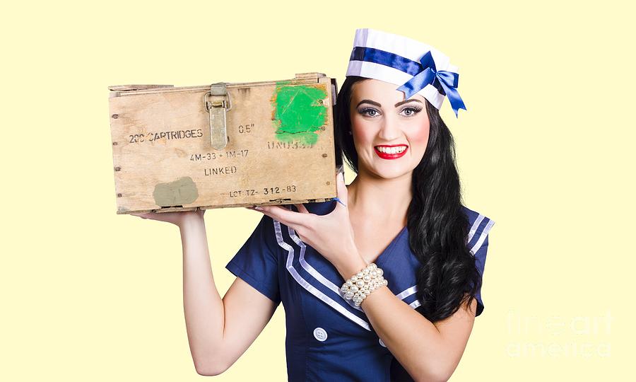 Isolated pin up girl holding a military arms box Photograph by Jorgo Photography