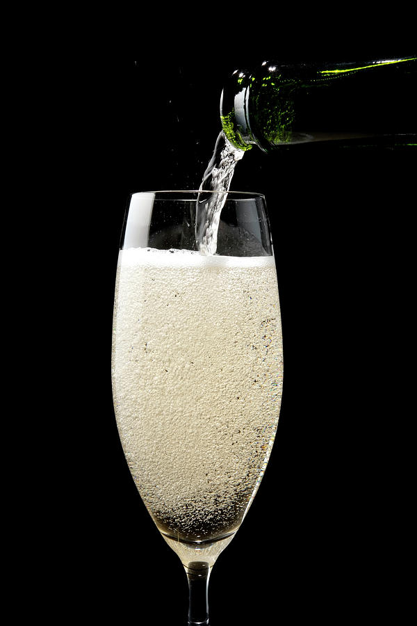 Isolated Shot Of Pouring Champagne Photograph by Kyoshino