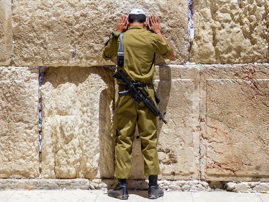 Israeli Soldier Praying At The Wailing Wall The Kotel At Jerusalem
