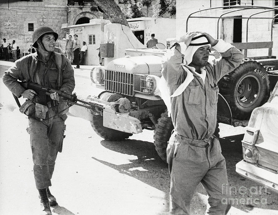 Israeli Soldier With A Jordanian Captive Photograph by Bettmann
