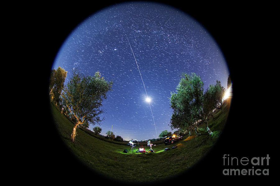 Iss Trail In Front Of The Moon Photograph by Miguel Claro/science Photo Library