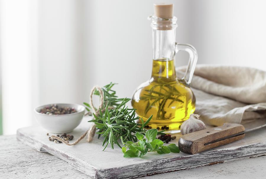 Italian Herbs With Olive Oil And Pepper Photograph by Valeria Aksakova