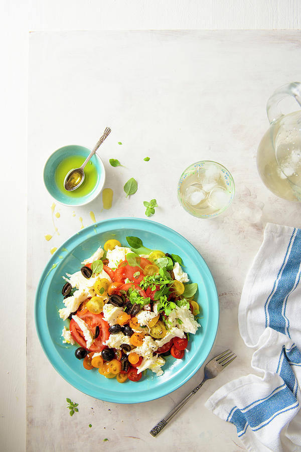 Italian Mozzarella And Tomatoes Summer Salad With Black Olives Photograph by Magdalena Hendey