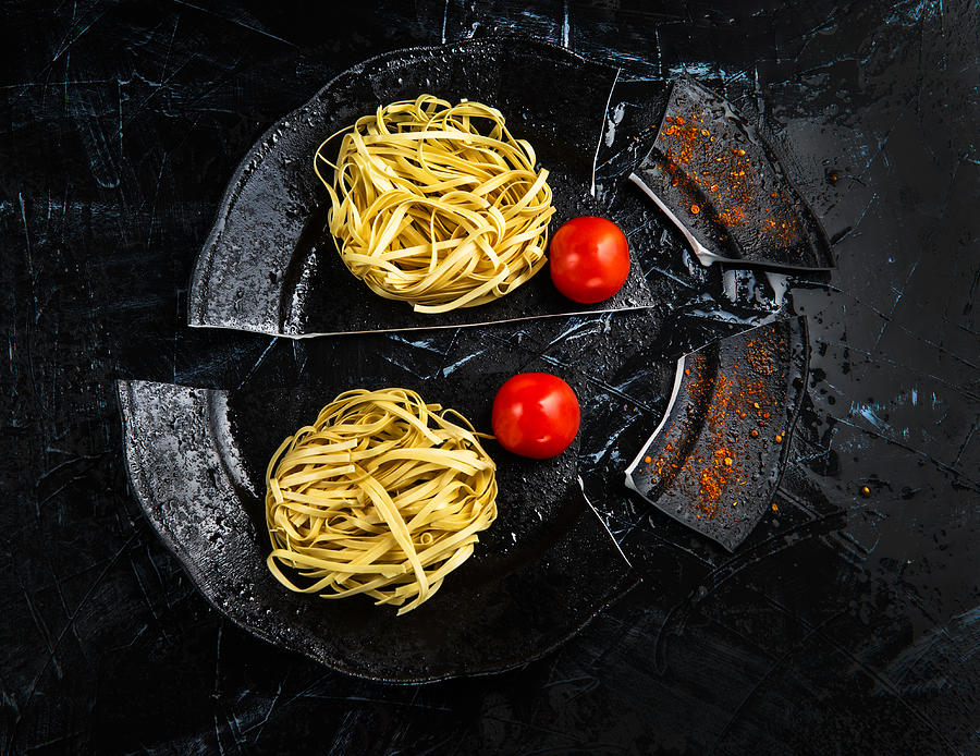 Italian Pasta On A Broken Plate Photograph by Igor Khobotov