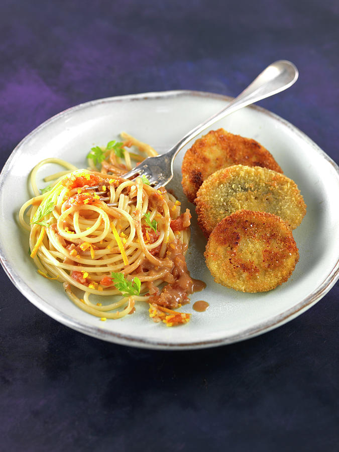 Italian-style Mushroom Escalopines, Spaghettis In Crushed Tomato And Lemon And Orange Zests Photograph by Rivire