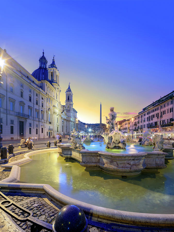 Castle Digital Art - Italy, Latium, Roma District, Rome, Piazza Navona, Fontana Del Moro Agonal Obelisk And Church Of Santa Agnese. Overview In The Evening Lights by Paolo Giocoso