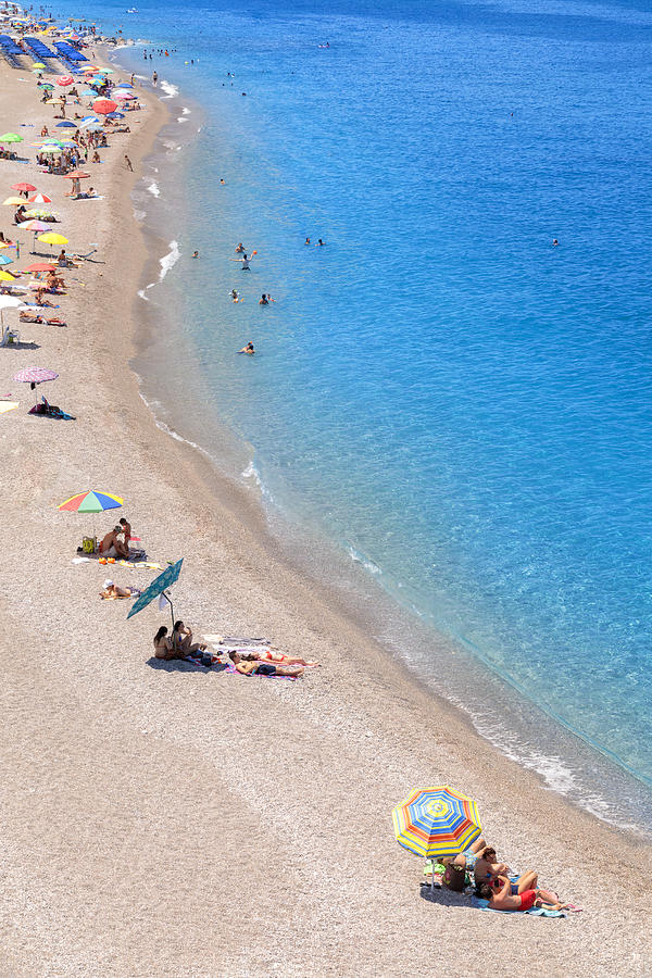 Italy, Sicily, Messina District, Capo Dorlando, Capo Dorlando. Faro Beach, City Beach With Transparent Sea And Umbrellas. Waterfront With Bathers Digital Art by Paolo Giocoso