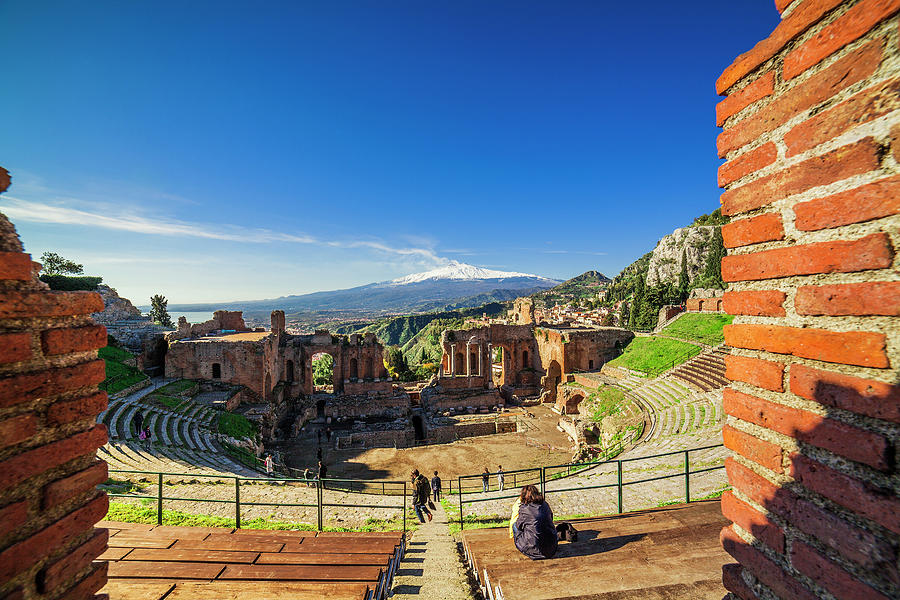 Italy, Sicily, Messina District, Mediterranean Sea, Taormina, Greek Theatre With Gulf Of Naxos And Mount Etna In Background Digital Art by Alessandro Saffo