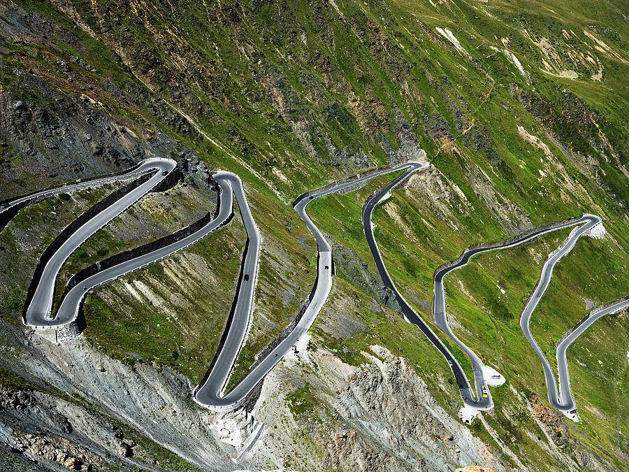 Image Digital Art - Italy, Trentino-alto Adige, Bolzano District, Alps, Venosta Valley, Stelvio, The Stelvio Road, View From The Pass by Franco Cogoli