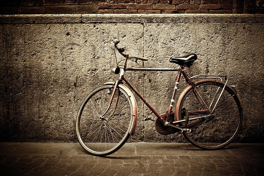 Italy Vintage Bicycle Against Grunge Photograph by Moreiso