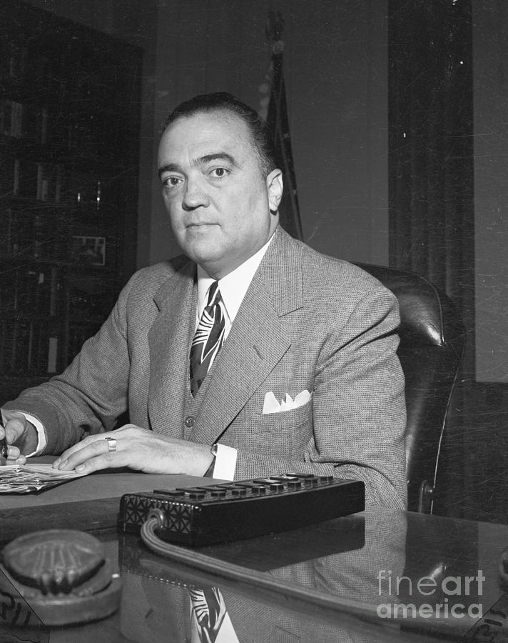 Black And White Photograph - J. Edgar Hoover Standing In His Fbi by Bettmann