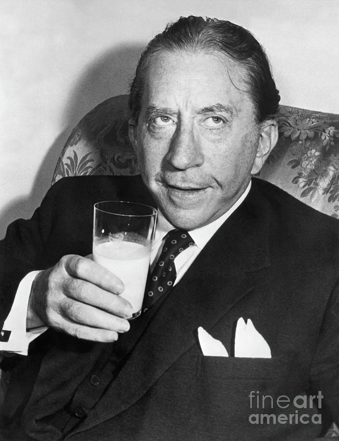 J. Paul Getty Drinking A Glass Of Milk Photograph by Bettmann